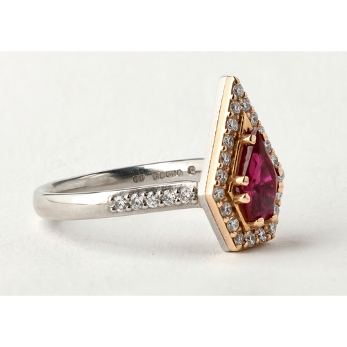 4 - A MODERN 18 CARAT WHITE GOLD AND PLATINUM RUBY AND DIAMOND RING
The fancy cut ruby, weight 1.35cts, ... 
