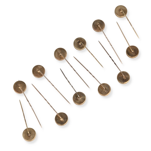 45 - A SET OF TWELVE 9CT GOLD NOVELTY GOLF STICK PINS
Each with printed roundel depicting a golfer mid-sw... 