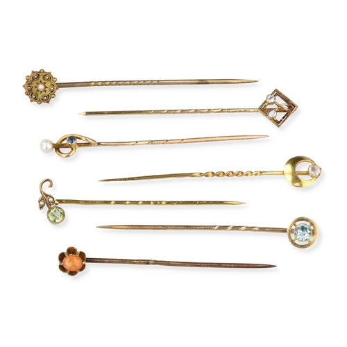 46 - A GROUP OF SEVEN 9CT GOLD STICK PINS, SET WITH VARIOUS STONES INCLUDING DIAMOND, PEARLS
Total weight... 