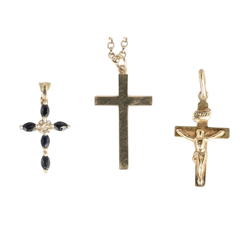 52 - THREE 9CT GOLD CROSSES, ONE WITH 9CT GOLD CHAIN
Total weight: 5.1gms