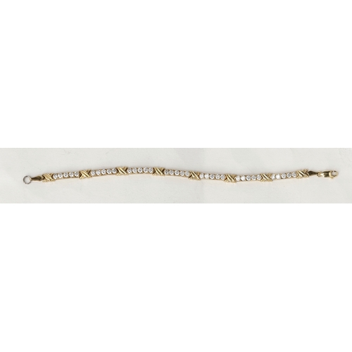 55 - A 14CT MEXICAN GOLD AND CUBIC ZIRCONIA BRACELET
6.3 gms