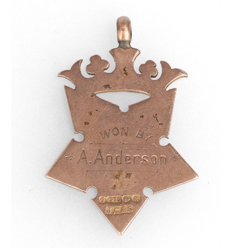 58 - A 9CT GOLD SPORTING MEDAL
Weight: 4.8gms
Inscribed 'KILM.K. 1902 C. CUP - Won by A. Anderson'
 ... 