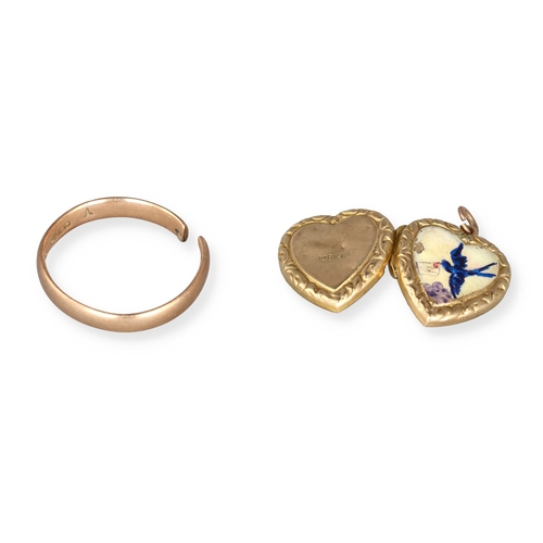60 - A 9CT GOLD BAND (AF) TOGETHER WITH A 9CT GOLD AND ENAMEL HEART SHAPED LOCKET
Total weight: 4.9gms
 ... 
