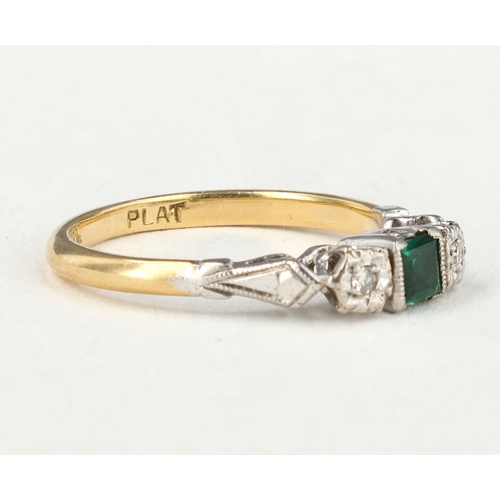 61 - AN 18CT GOLD AND PLATINUM THREE STONE RING, CENTRAL SQUARE CUT EMERALD WITH TWO DIAMONDS
Band marked... 