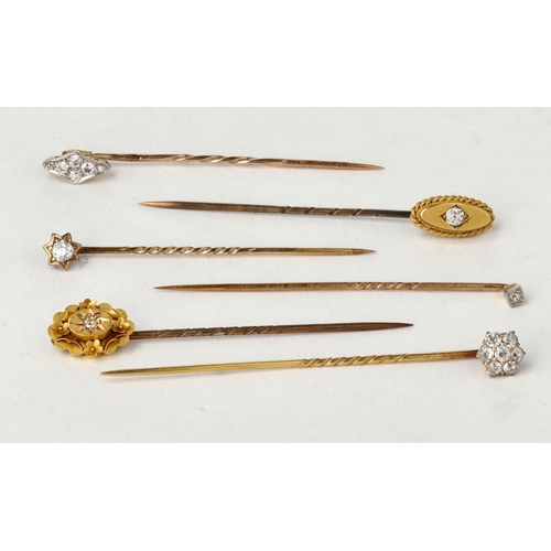 62 - A GROUP OF 15CT AND 9CT GOLD STICK PINS, EACH SET WITH DIAMONDS
Some with replacement metal pins.
To... 