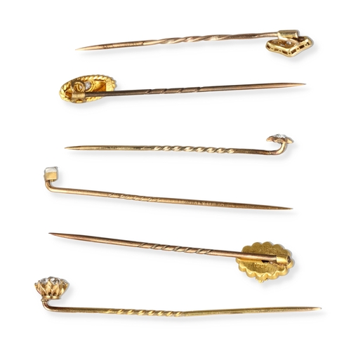 62 - A GROUP OF 15CT AND 9CT GOLD STICK PINS, EACH SET WITH DIAMONDS
Some with replacement metal pins.
To... 