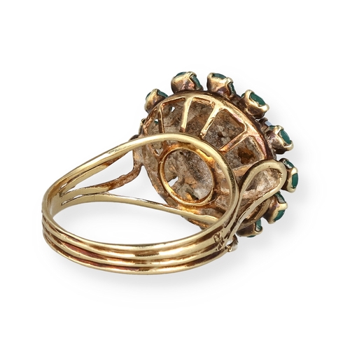 67 - A 14CT GOLD CLUSTER RING SET WITH EMERALDS AND OPALS
Weight: 4.7gms