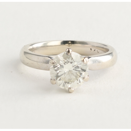 67C - A SOLITAIRE DIAMOND RING, 1.50CT SET IN 18CT WHITE GOLD
Weight: 3.6gms
Colour approximately K/L, cla... 