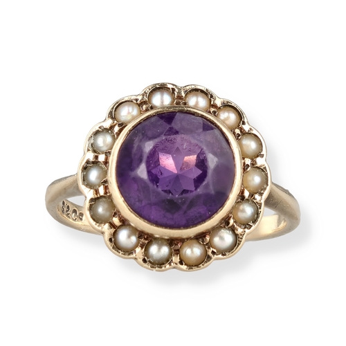 73 - A 9CT GOLD RING SET WITH AN AMETHYST AND SEED PEARLS
Weight: 3.0gms
In black jewellery box.... 