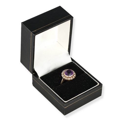 73 - A 9CT GOLD RING SET WITH AN AMETHYST AND SEED PEARLS
Weight: 3.0gms
In black jewellery box.... 
