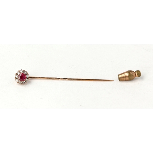 84 - A 9CT GOLD STICK PIN WITH RUBY AND DIAMOND CLUSTER
Weight: 1.7gms
In tooled leather box by Lloyd Law... 