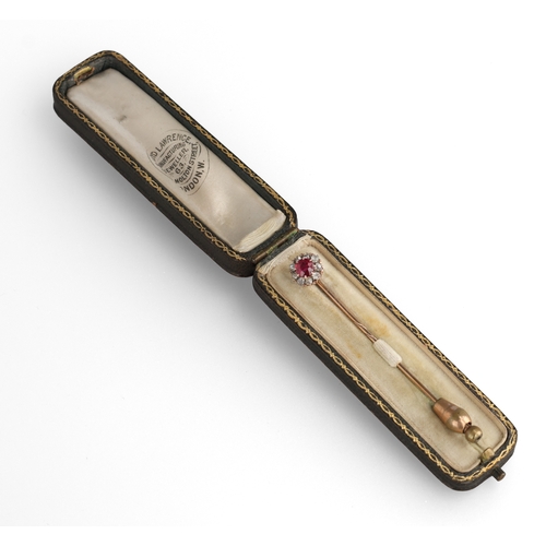 84 - A 9CT GOLD STICK PIN WITH RUBY AND DIAMOND CLUSTER
Weight: 1.7gms
In tooled leather box by Lloyd Law... 