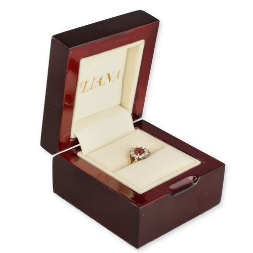 9 - A FINE 18CT GOLD DIAMOND AND RUBY RING
3.5 gms
In associated cushioned ring box.... 
