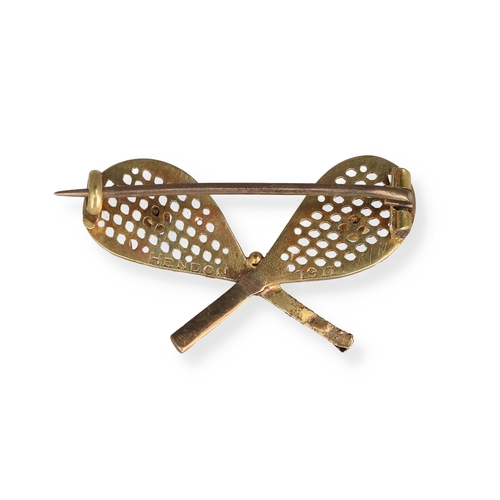 90 - A 9CT GOLD TENNIS RACKET AND BALL BROOCH
Weight: 1.5gms
