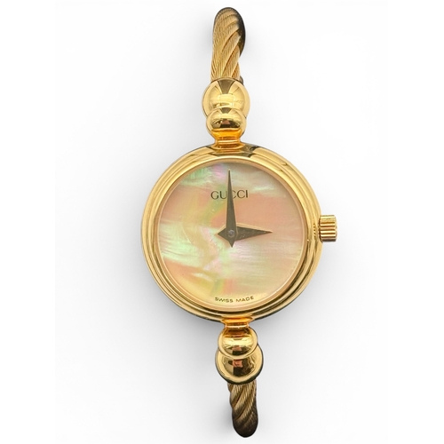 92 - A 9CT GOLD CASED INCARNA LADIES WRIST WATCH TOGETHER WITH A GUCCI WATCH
 