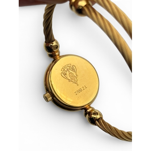 92 - A 9CT GOLD CASED INCARNA LADIES WRIST WATCH TOGETHER WITH A GUCCI WATCH
 
