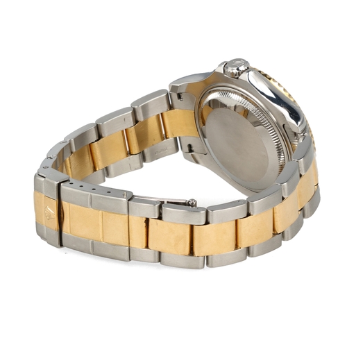 93 - ROLEX: A GENTLEMAN'S18CT GOLD AND STEEL YACHT-MASTER WATCH
With Rolex papers.
 