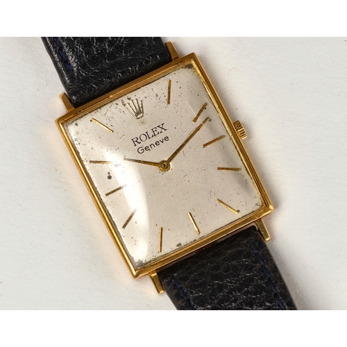 95 - ROLEX: AN 18CT GENEVE WATCH WITH LEATHER STRAP