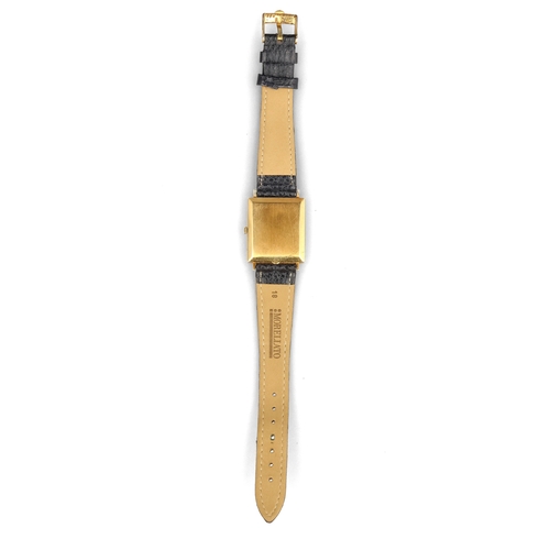 95 - ROLEX: AN 18CT GENEVE WATCH WITH LEATHER STRAP