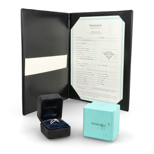 96 - TIFFANY & CO: A PLATINUM SOLITAIRE DIAMOND RING TOGETHER WITH A MATCHING PLATINUM WEDDING BAND
W... 