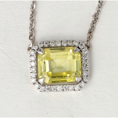 103 - AN 18CT WHITE GOLD NECKLACE WITH YELLOW STONE
Weight: