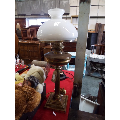 239 - A brass and glass oil lamp converted to electricity