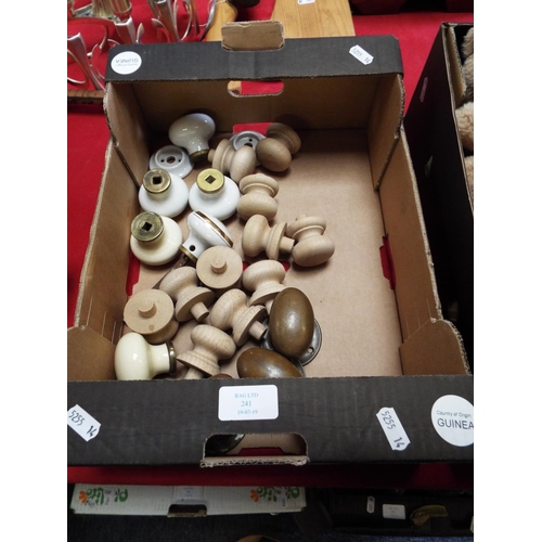 241 - A mixed selection of ceramic brass and wooden door knobs