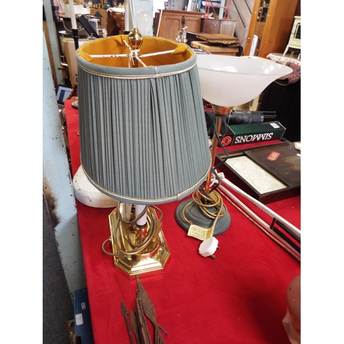 246 - An ornate brass two branch table lamp and shade together with another