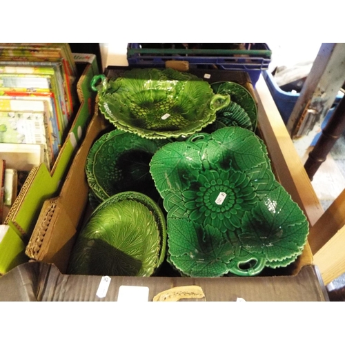 251 - A selection of green glazed grape and vine decorated comports, plates to include a pair of Wedgwood ... 