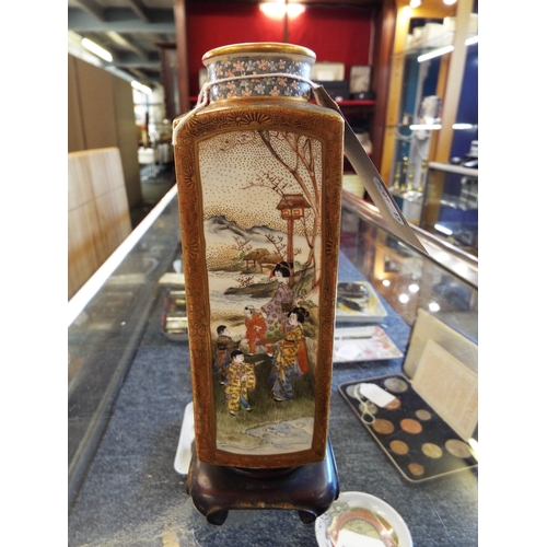 76 - A 19thC Satsuma vase of rectangular form hand painted with panels of geisha, children, birds and tra... 