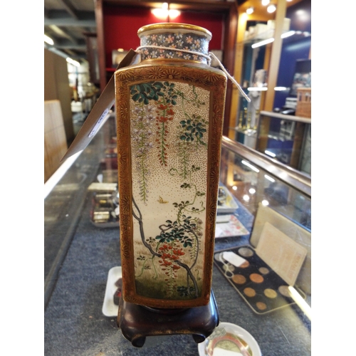 76 - A 19thC Satsuma vase of rectangular form hand painted with panels of geisha, children, birds and tra... 