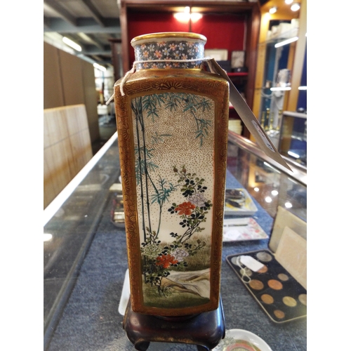 76 - A 19thC Satsuma vase of rectangular form hand painted with panels of geisha, children, birds and tra... 