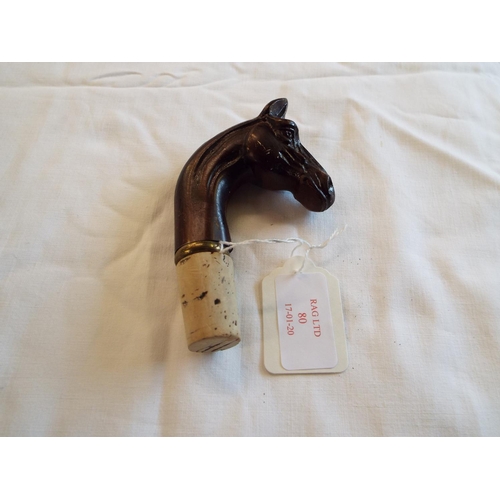 80 - A walking cane handle in the form of a horse's head