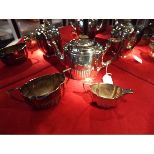 88 - A silver-plated tea set with fluted decoration