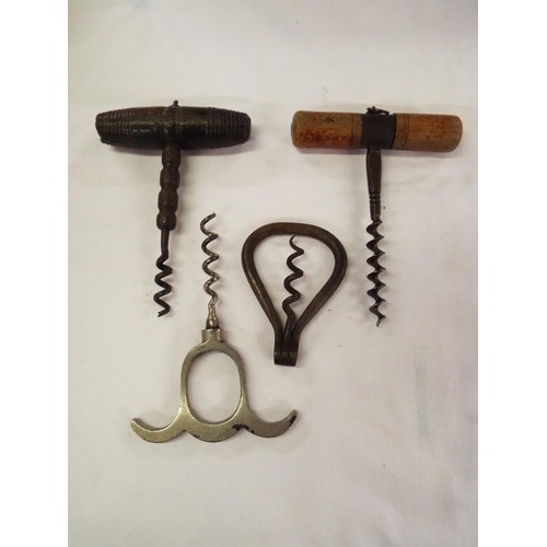 79 - A selection of miscellaneous items to include Victorian and later corkscrews, a 1970's glass cubist ... 