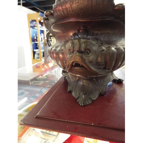 17 - A 19thC H. Luppens & Co of Brussels bronze de-art ornate table centre piece, having a fluted body wi... 