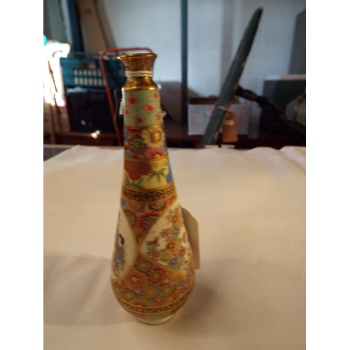 21 - A miniature Satsuma vase with gilt and pictorial decorated panel signed to base 5