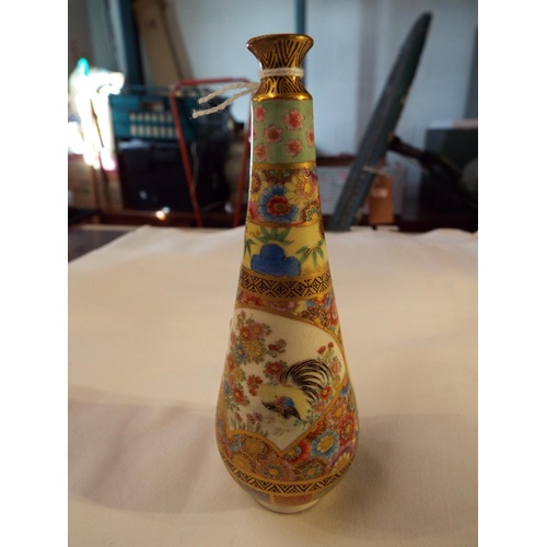 21 - A miniature Satsuma vase with gilt and pictorial decorated panel signed to base 5