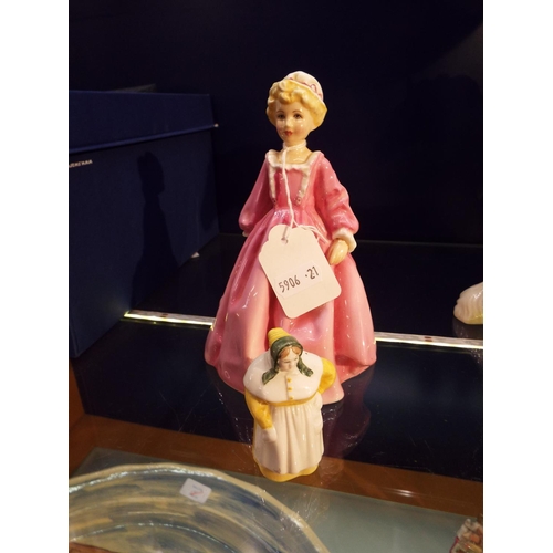 13 - A Royal Worcester figurine and a Royal Worcester candle snuffer 'The Cook'