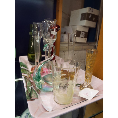 32 - Ten items of glassware to include glass swan, bud vases etc