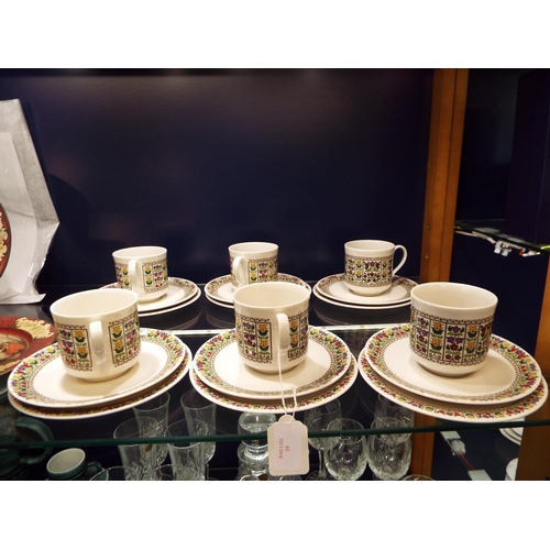 39 - A Royal Doulton 'Fireglow' set of six cups, saucers and side plates