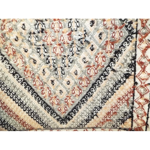 454 - A white ground Tunisian hall runner with geometric pattern