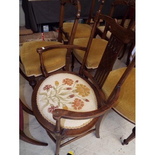 461 - An Edwardian mahogany oval shaped bedroom chair having inlaid back, splat padded upholstered seat re... 