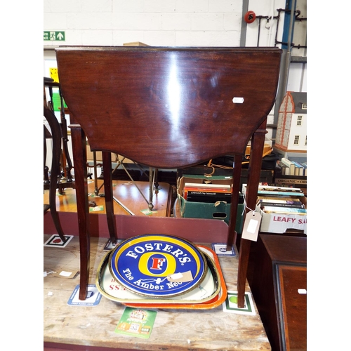 645 - A mahogany and boxwood inlaid drop-leaf work table with frieze drawer resting on tapering supports