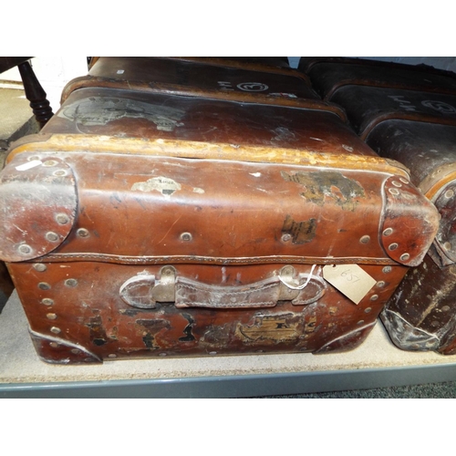 651 - A vintage wooden bound steamer trunk