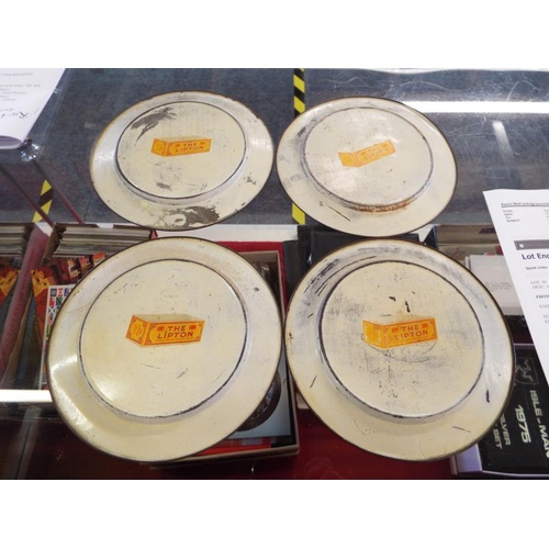 40 - A set of four rare 'Lipton's Advertising Tin' tea plates with pictorial scenes