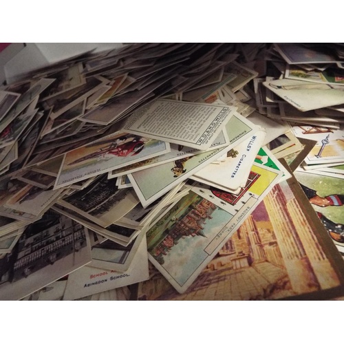 60 - A large box of vintage cigarette cards (including sports) to include Ogdens, J Wix, John Player, Wil... 