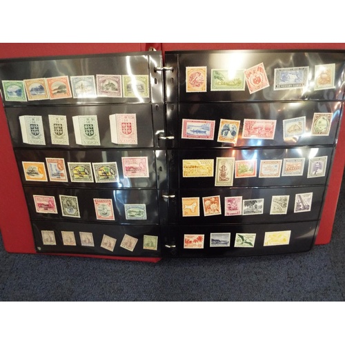 62 - Four stamp albums to include Argentina, Cuba, Dubai, Magyar, Colombia etc