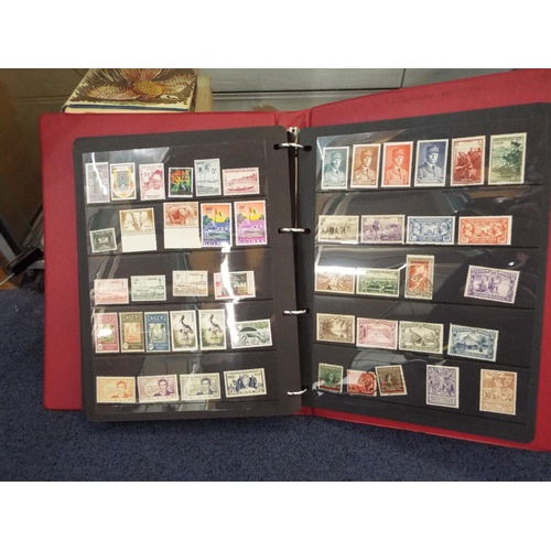 62 - Four stamp albums to include Argentina, Cuba, Dubai, Magyar, Colombia etc