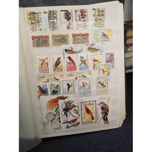 62 - Four stamp albums to include Argentina, Cuba, Dubai, Magyar, Colombia etc